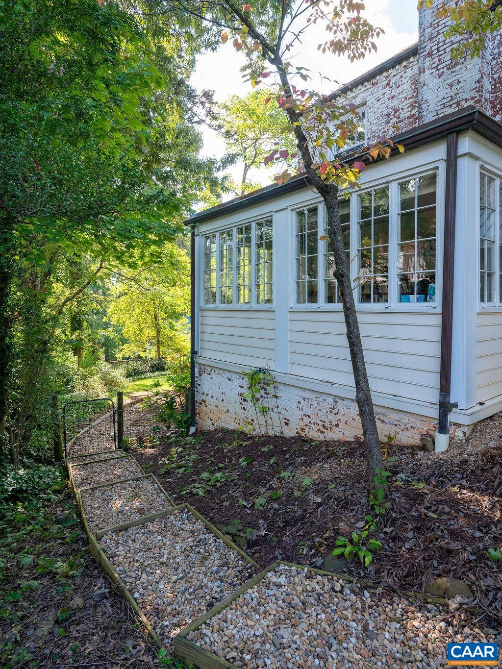1334 Rugby Road Charlottesville, VA 22903 - Photo 35 of 36 a front view of a house with garden