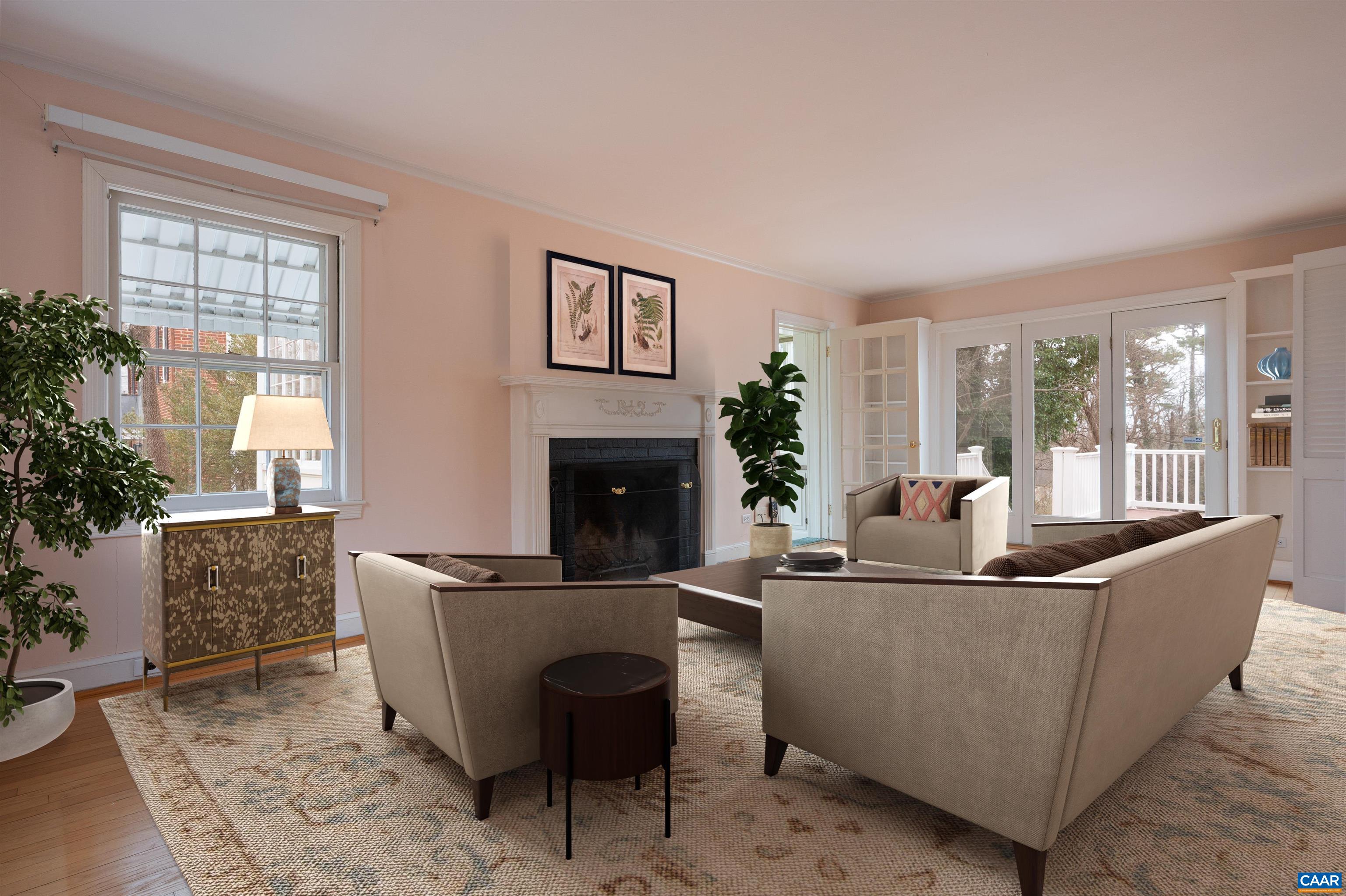 1334 Rugby Road Charlottesville, VA 22903 - Photo 5 of 36 a living room with furniture and a fireplace