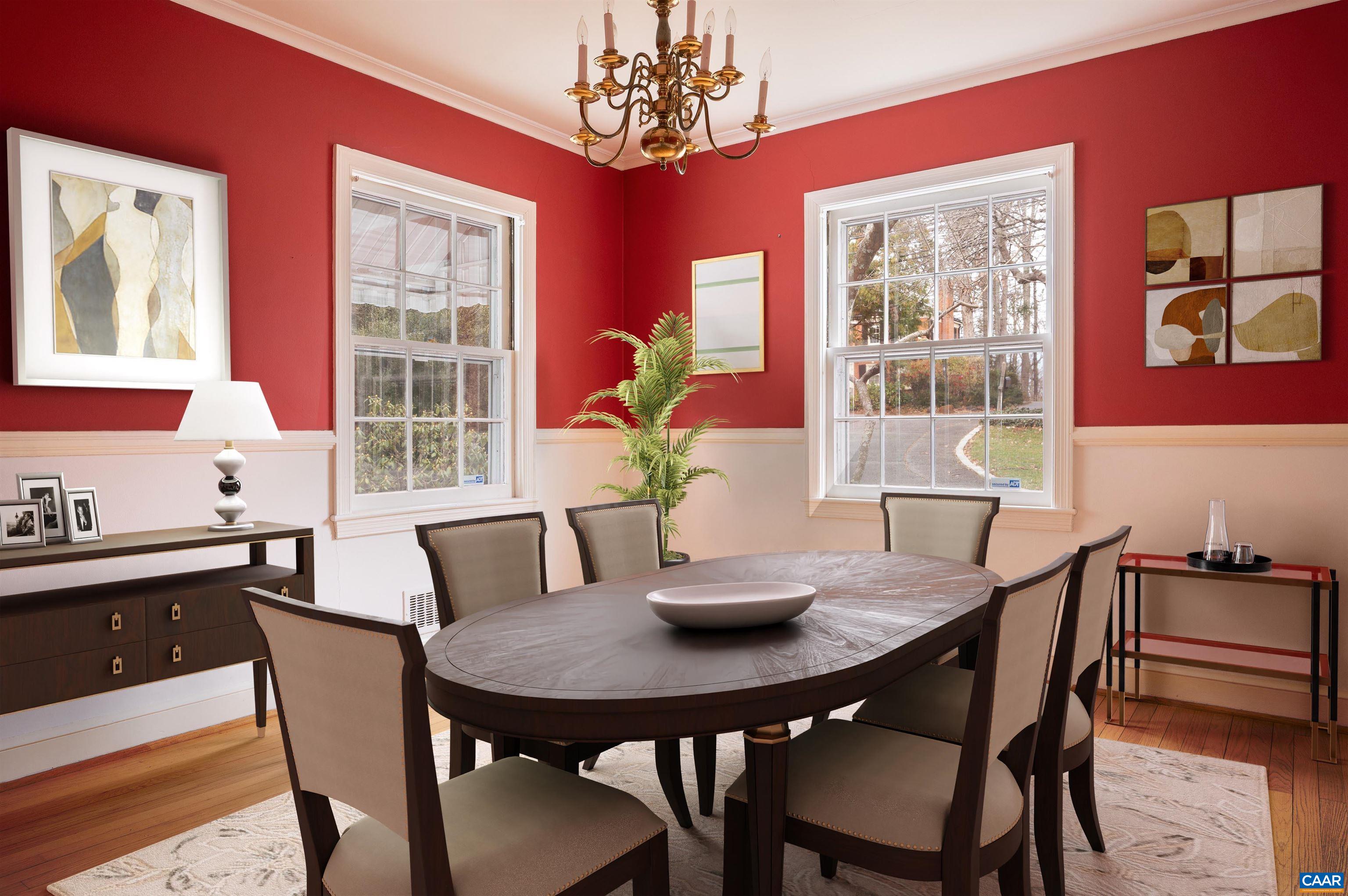 1334 Rugby Road Charlottesville, VA 22903 - Photo 7 of 36 a view of a dining room with furniture window and wooden floor