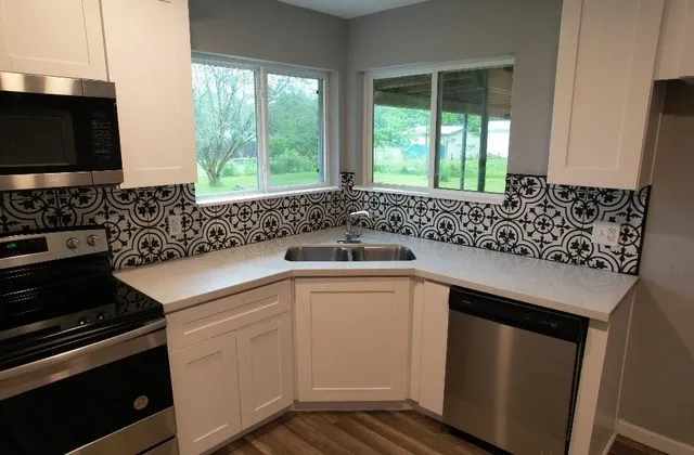 a view of room with window and hardwood floor