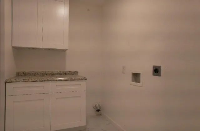 a view of a bathroom from a hallway