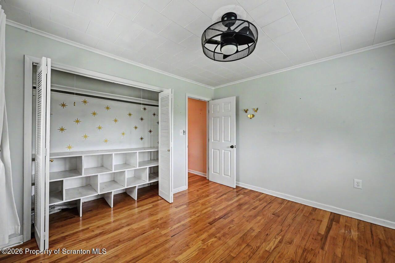 457 Craig Road Dalton, PA 18414 - Photo 72 of 114 a view of a livingroom with wooden floor and a window