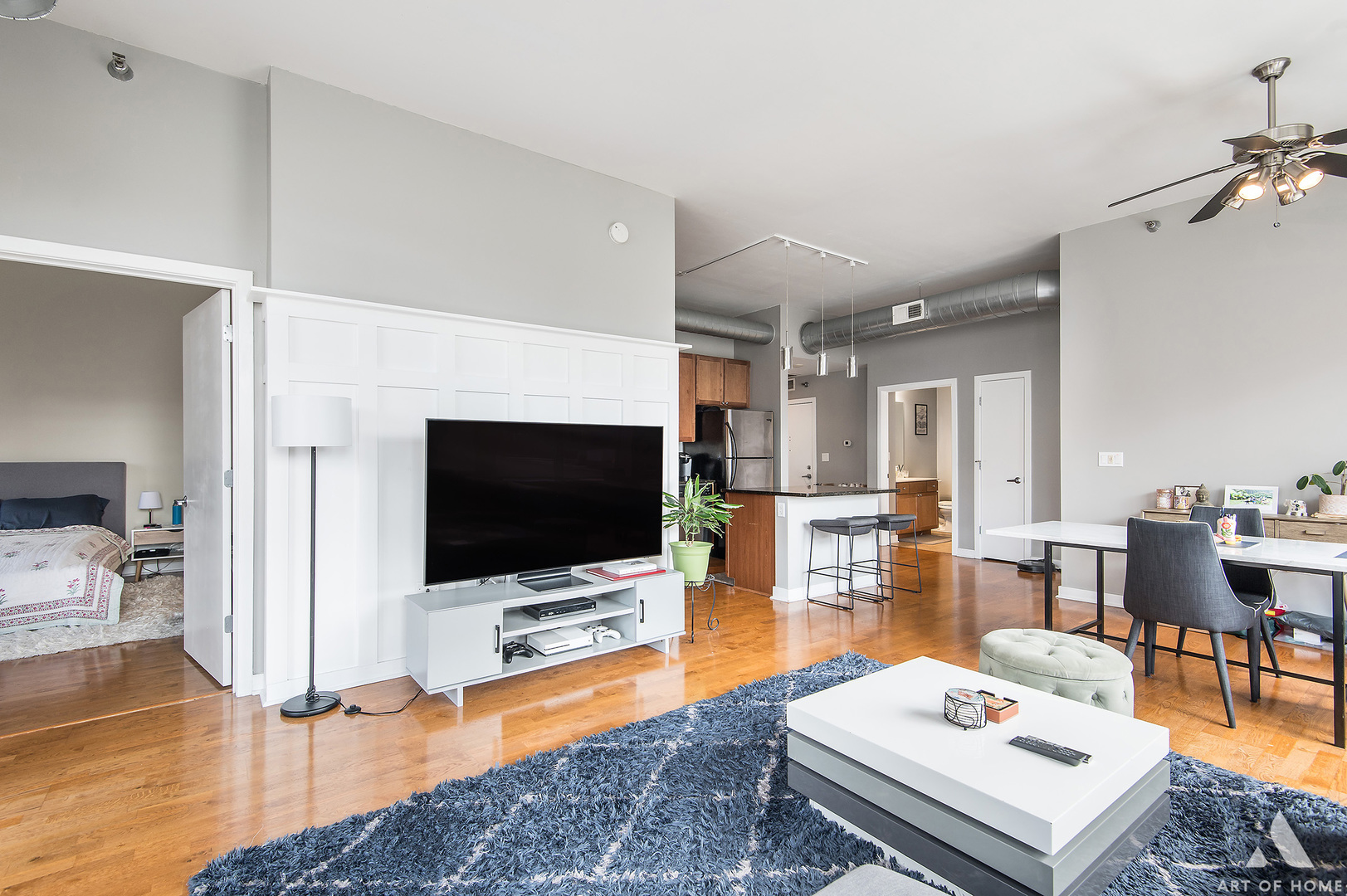 901 West Madison Street, Unit 407 Chicago, IL 60607 - Photo 11 of 39 a living room with furniture and a flat screen tv