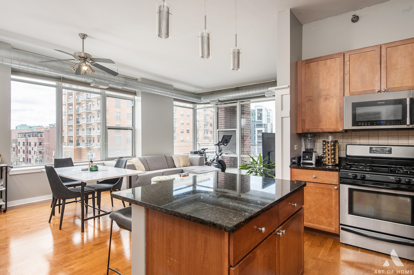 901 West Madison Street, Unit 407 Chicago, IL 60607 - Photo 8 of 39 a kitchen with granite countertop lots of counter top space and dining table