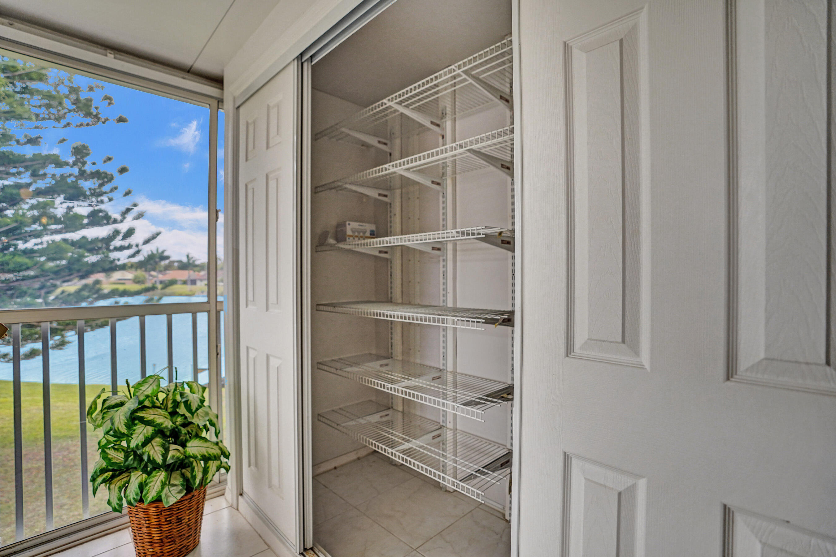 1260 Northwest 20th Avenue, Unit 203 Delray Beach, FL 33445 - Photo 15 of 48 Great Storage Closet