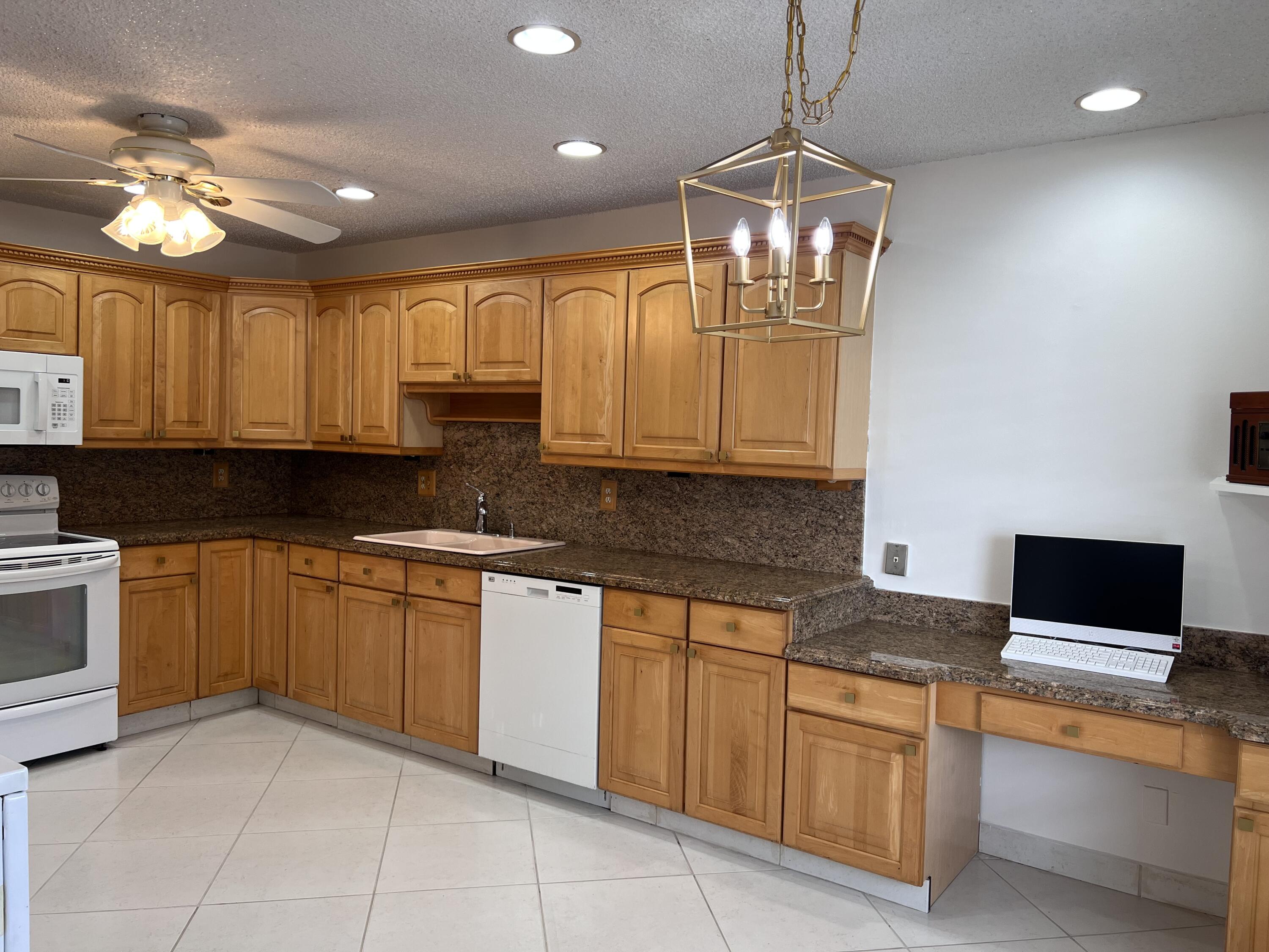 1260 Northwest 20th Avenue, Unit 203 Delray Beach, FL 33445 - Photo 19 of 48 Kitchen