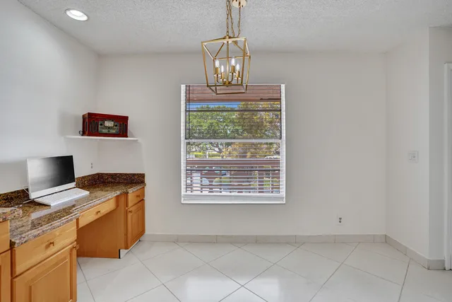 $215,000 | 1260 Northwest 20th Avenue, Unit 203, Delray Beach, FL 33445