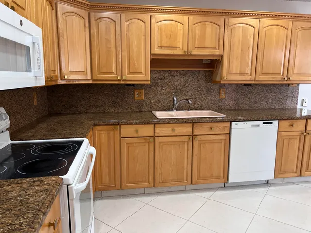 $215,000 | 1260 Northwest 20th Avenue, Unit 203, Delray Beach, FL 33445