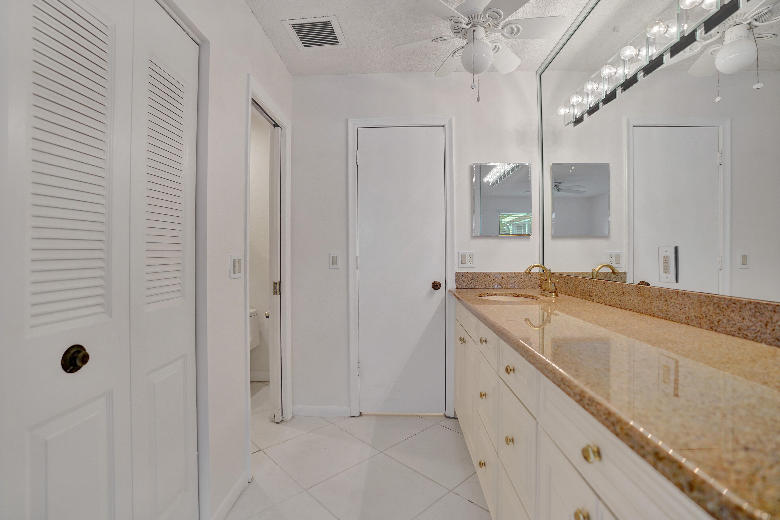 1260 Northwest 20th Avenue, Unit 203 Delray Beach, FL 33445 - Photo 26 of 48 Primary Bathroom