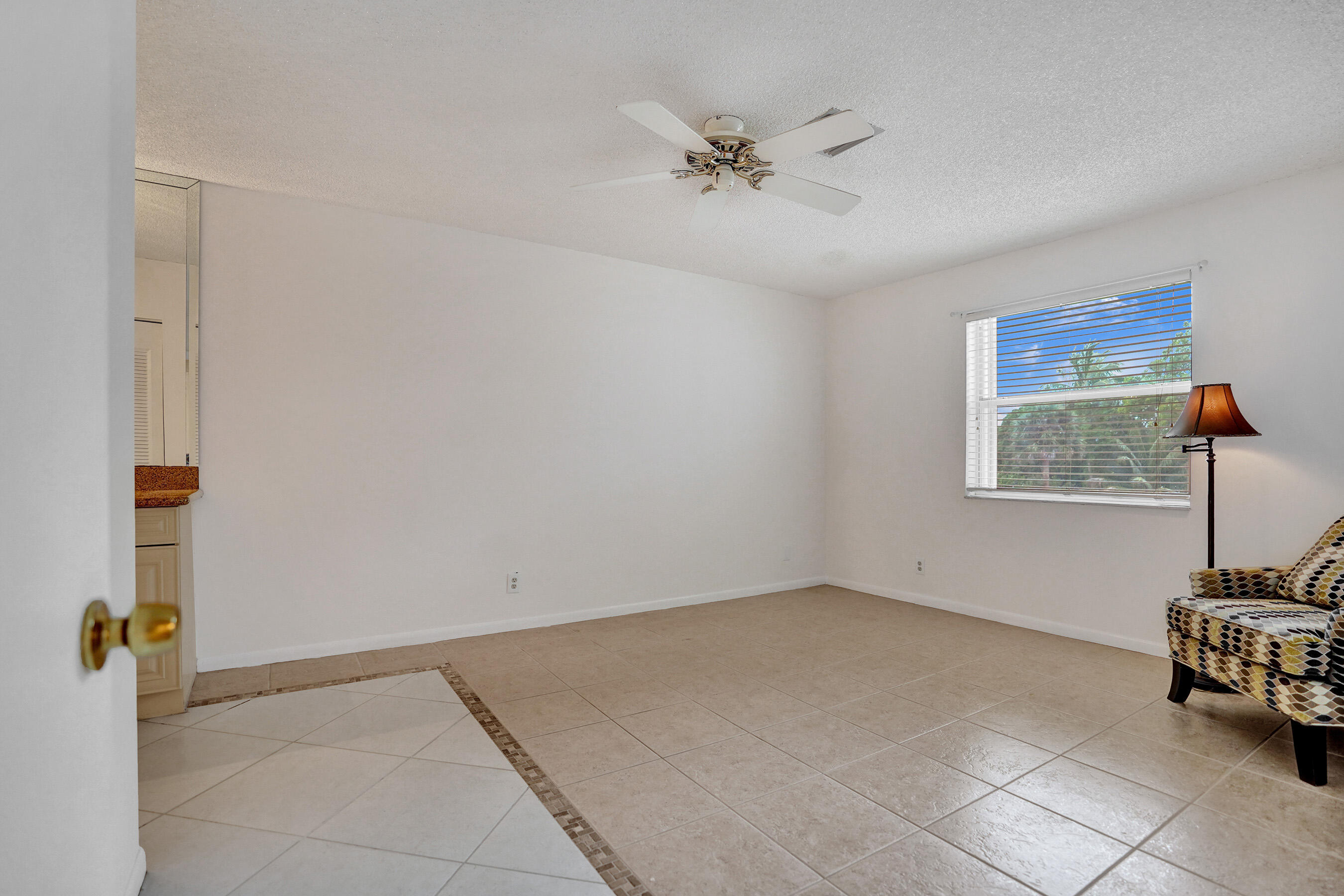 1260 Northwest 20th Avenue, Unit 203 Delray Beach, FL 33445 - Photo 31 of 48 Primary Bedroom