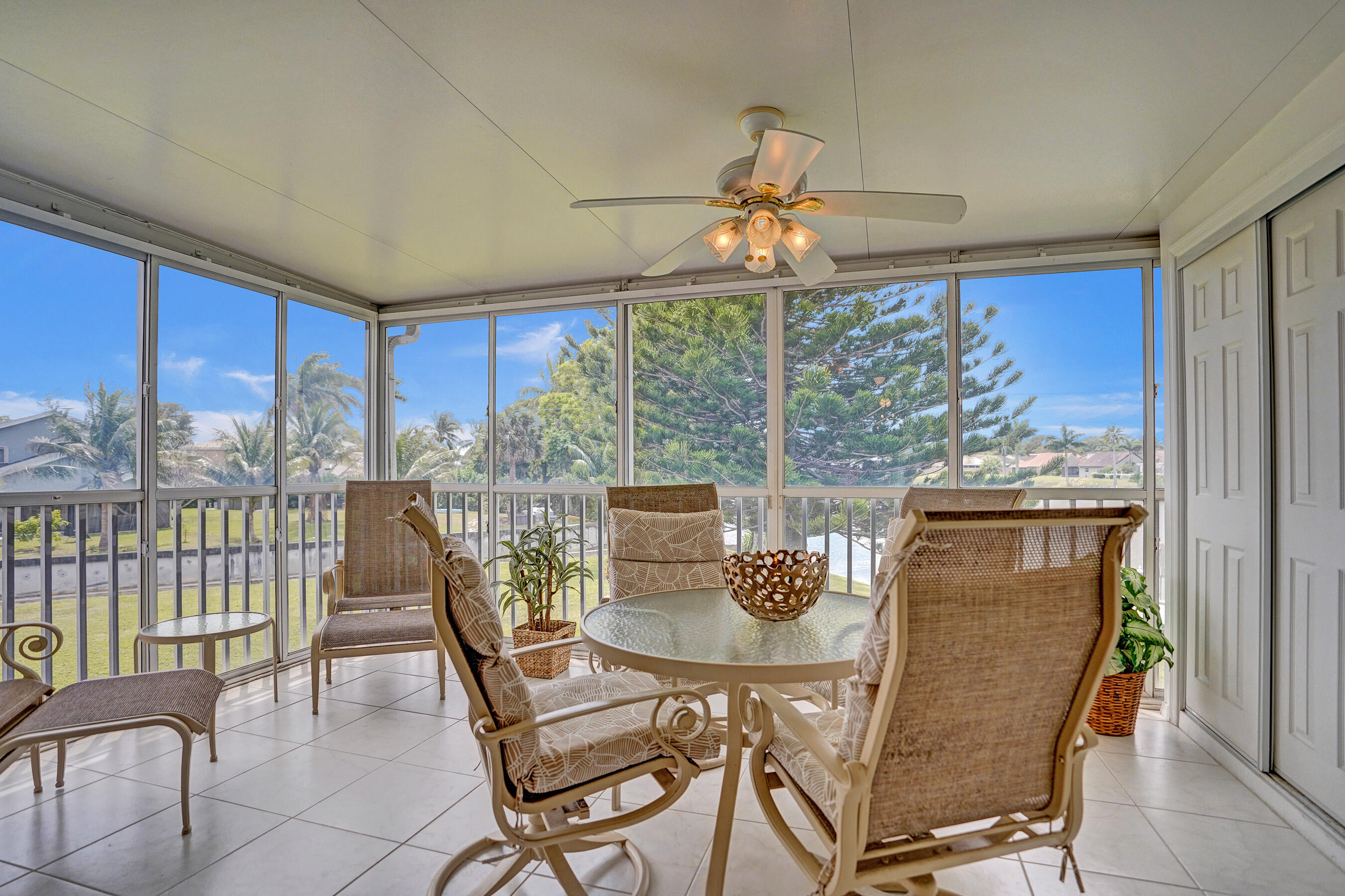 1260 Northwest 20th Avenue, Unit 203 Delray Beach, FL 33445 - Photo 8 of 48 Lanai all windows open