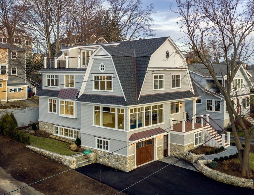 a front view of residential houses with yard