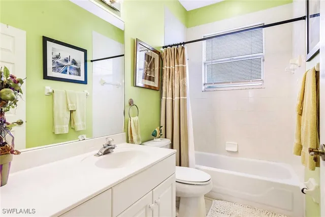 a view of a swimming pool with outdoor seating