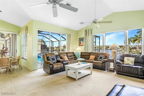 a open kitchen with cabinets a sink and appliances