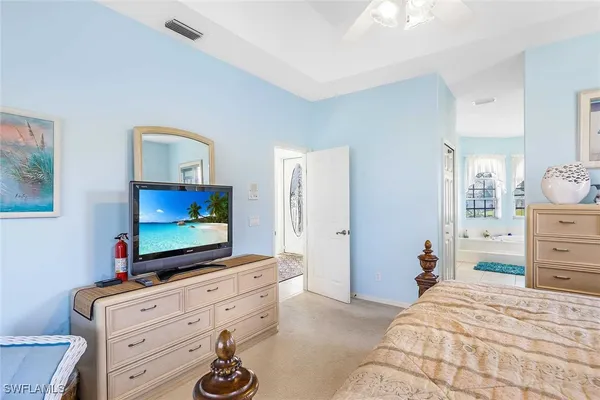 a spacious bathroom with sink shower and bathtub