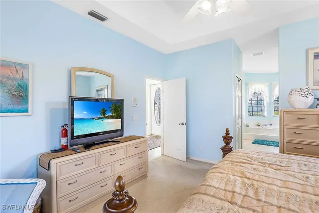 a spacious bathroom with sink shower and bathtub