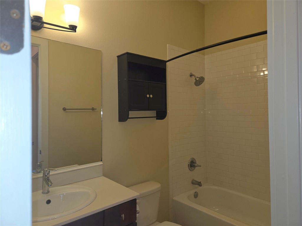 6000 South Congress Avenue, Unit 404 Austin, TX 78745 - Photo 19 of 23 a bathroom with a shower and a sink