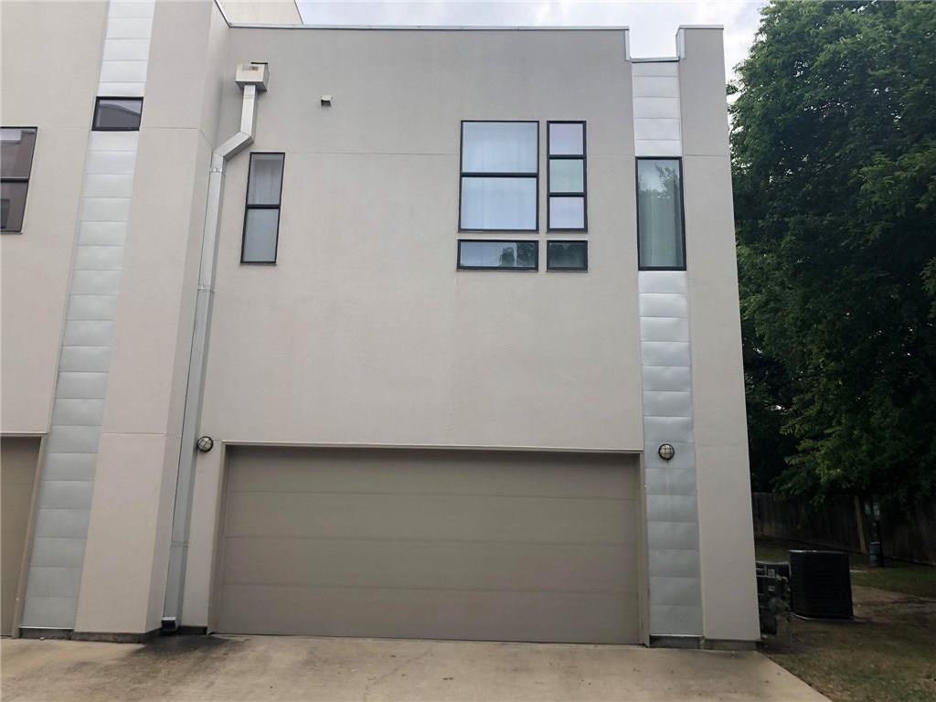 6000 South Congress Avenue, Unit 404 Austin, TX 78745 - Photo 20 of 23 a building with glass door and outdoor space