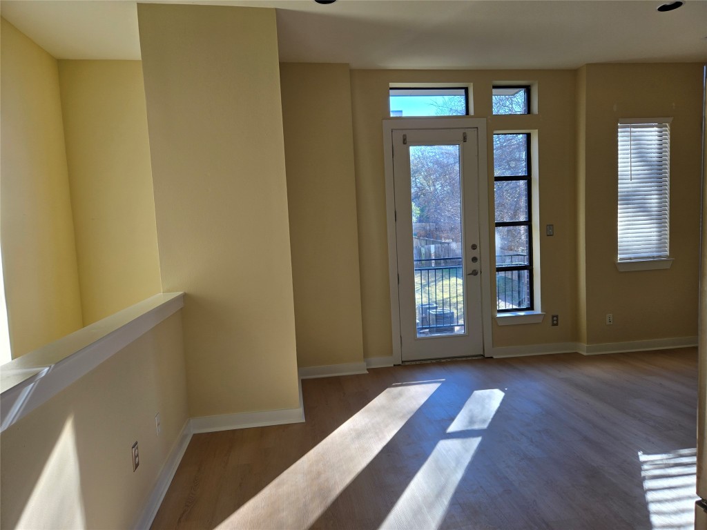 6000 South Congress Avenue, Unit 404 Austin, TX 78745 - Photo 10 of 23 a view of a room with wooden floors and walls