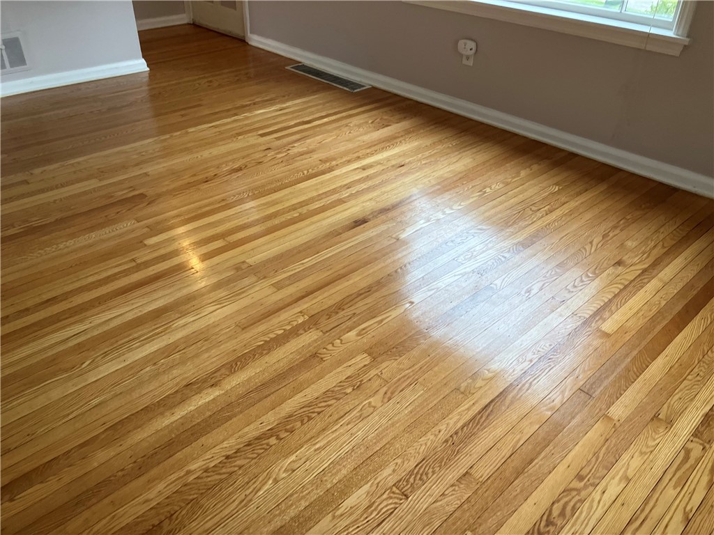 15 Maple Street Pittsford, NY 14534 - Photo 8 of 24
Recently refinished living room oak floor.
