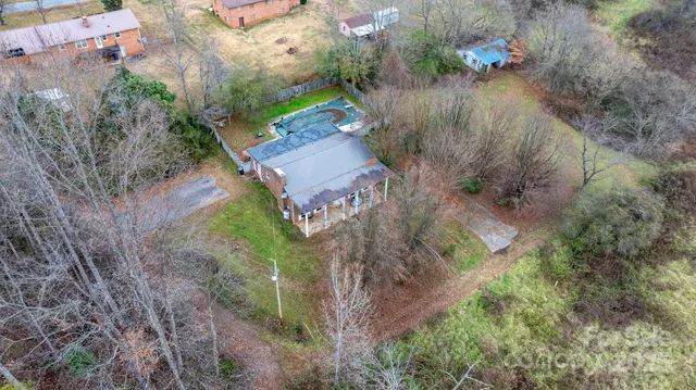 an aerial view of residential house with outdoor space