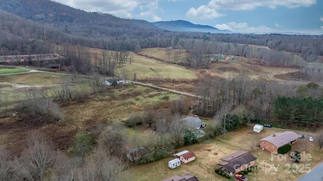 a view of a backyard with wooden floor