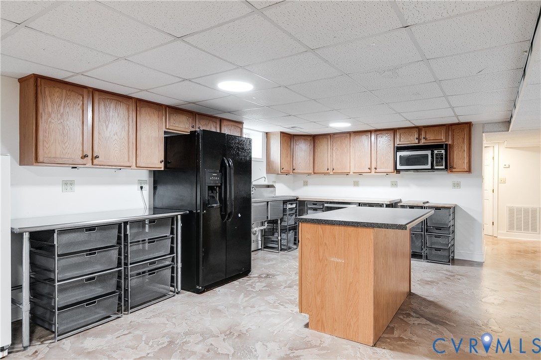 12365 Ashcake Road Ashland, VA 23005 - Photo 57 of 80 Spacious lower-level kitchen featuring wood cabine