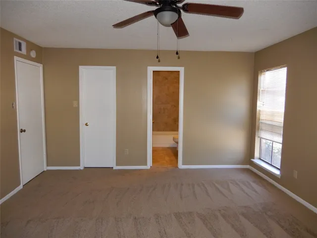 a bathroom with a sink a toilet and bathtub