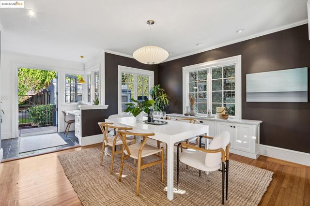 a kitchen with a sink and large window