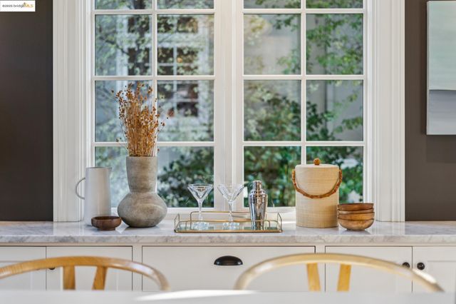 a view of backyard with seating area and green space