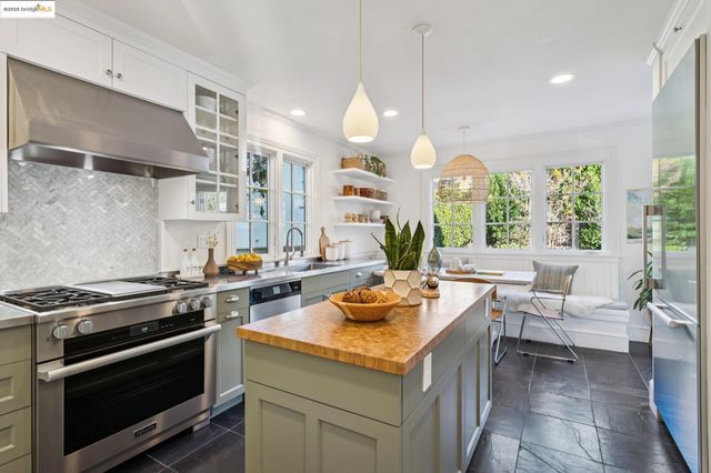 a view of entryway with wooden floor and door