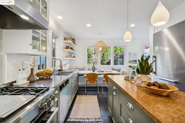 a bedroom with a bed wooden floor and window