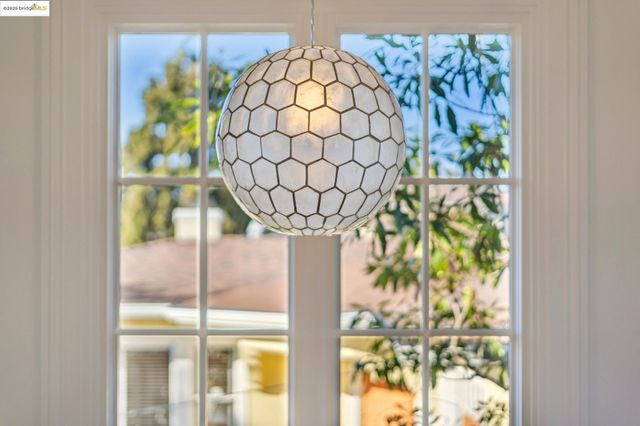a bathroom with a granite countertop shower a sink and a mirror