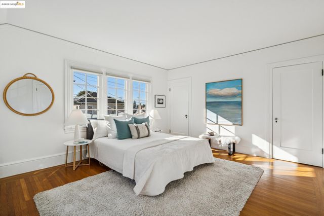 a view of a balcony dining area with furniture