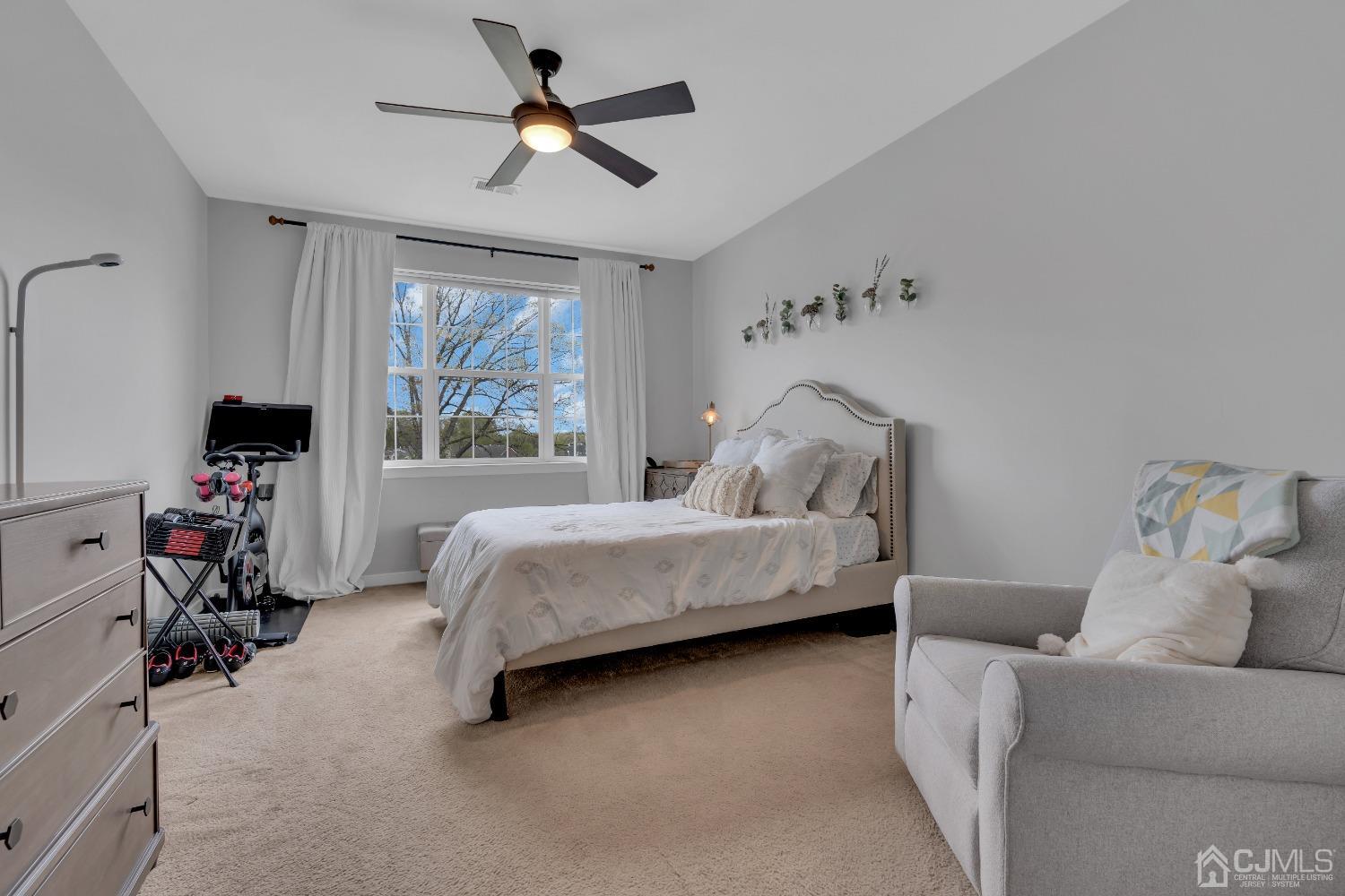 142 Tower Boulevard Piscataway, NJ 08854 - Photo 23 of 38 a bedroom with furniture and a large window