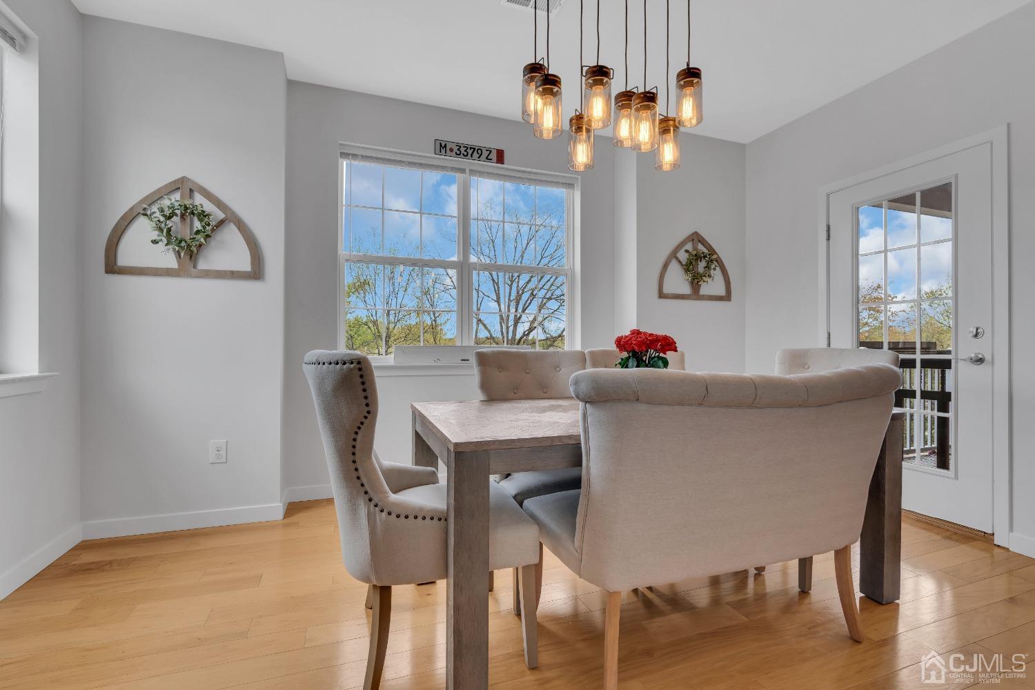 142 Tower Boulevard Piscataway, NJ 08854 - Photo 8 of 38 a dining room with furniture a chandelier and window