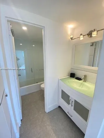 a view of a bathroom from a room