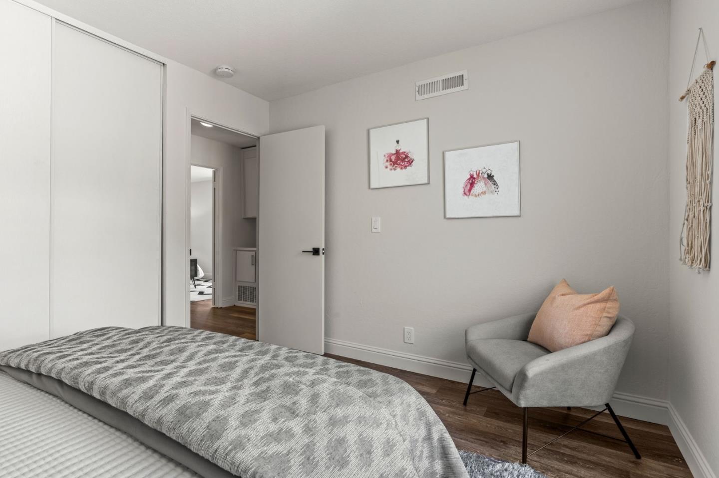 282 Coty Way San Jose, CA 95136 - Photo 30 of 69 a bedroom with a bed and a chair
