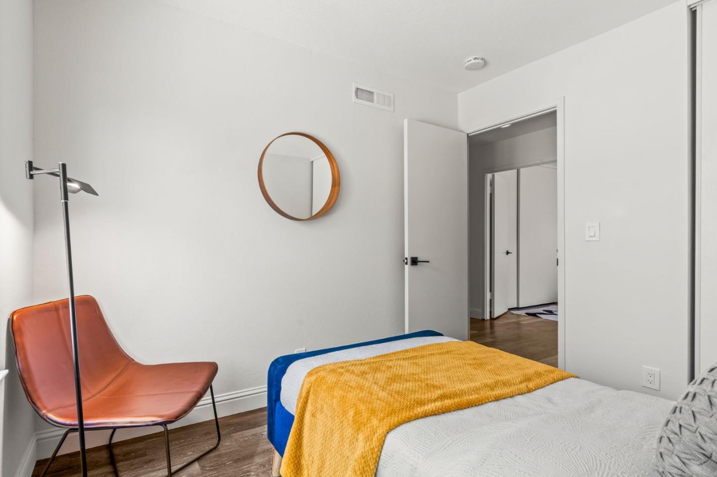 282 Coty Way San Jose, CA 95136 - Photo 32 of 69 a bedroom with a bed a chair and a window