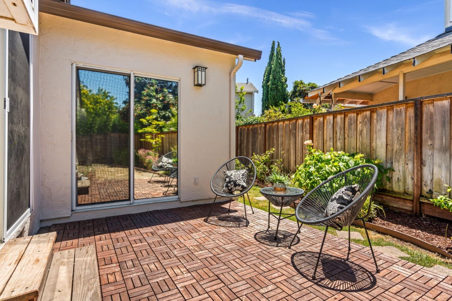 282 Coty Way San Jose, CA 95136 - Photo 43 of 69 a view of a chairs and table in backyard of the house