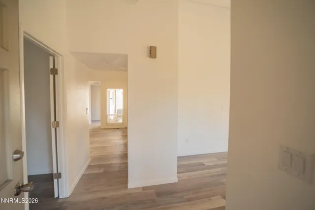 a view of a bathroom with wooden floor
