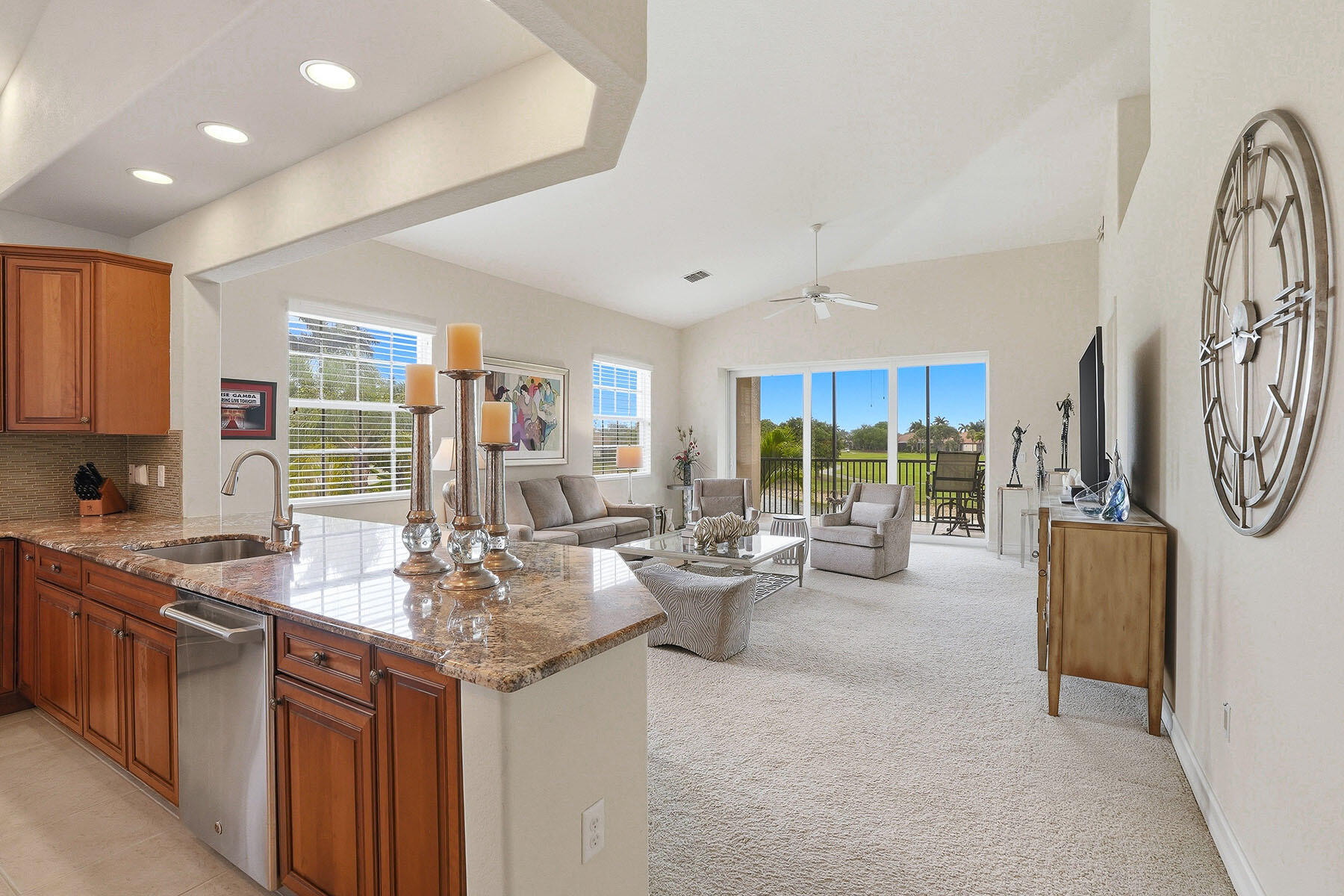 8605 Champions Point, Unit 103 Naples, FL 34113 - Photo 13 of 44 a very nice looking living room with a large window and dining table