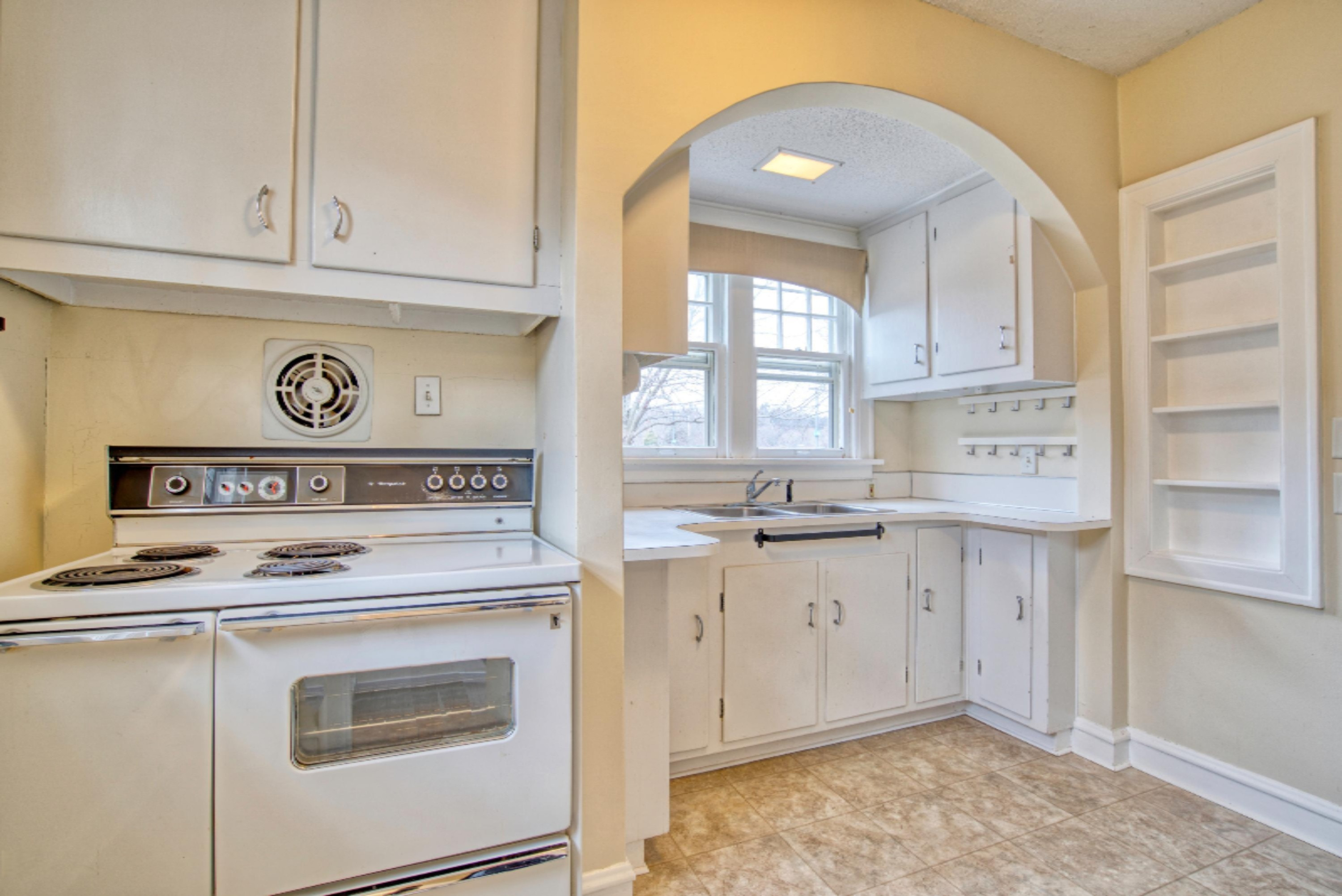 1515 Sheldon Road Grand Haven, MI 49417 - Photo 14 of 32 15. Kitchen Reverse Angle