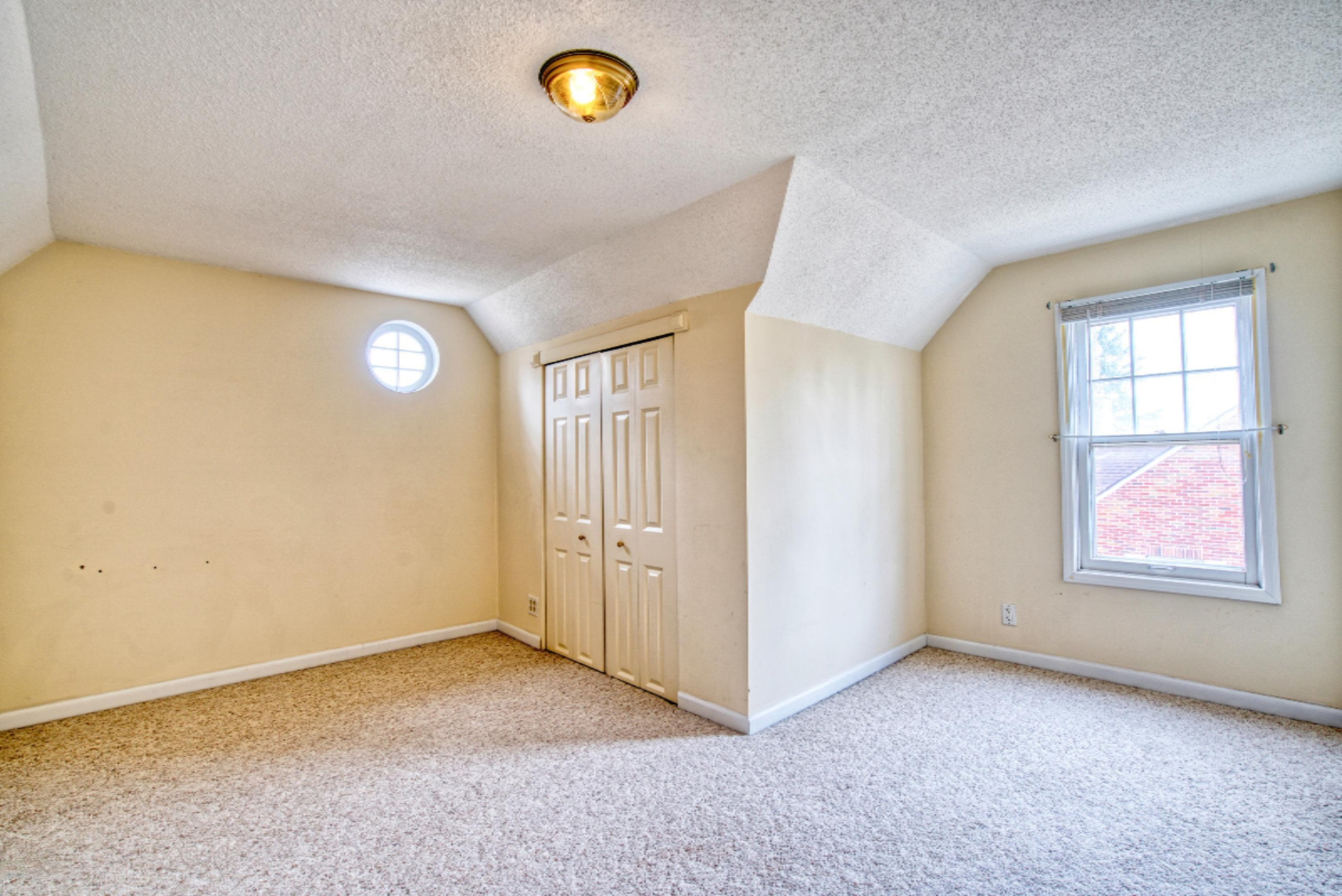 1515 Sheldon Road Grand Haven, MI 49417 - Photo 27 of 32 26. Bedroom 3 Angle