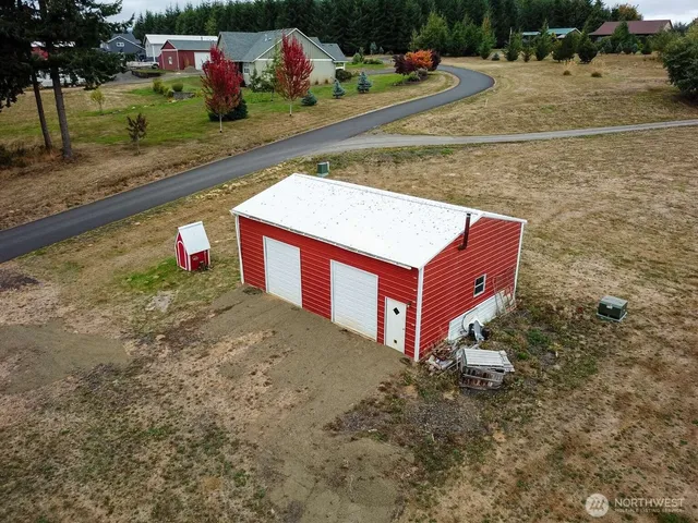 a view of a yard with an outdoor space