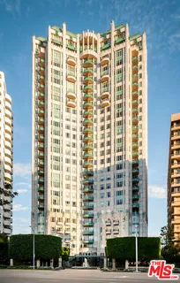 a front view of a building with a street