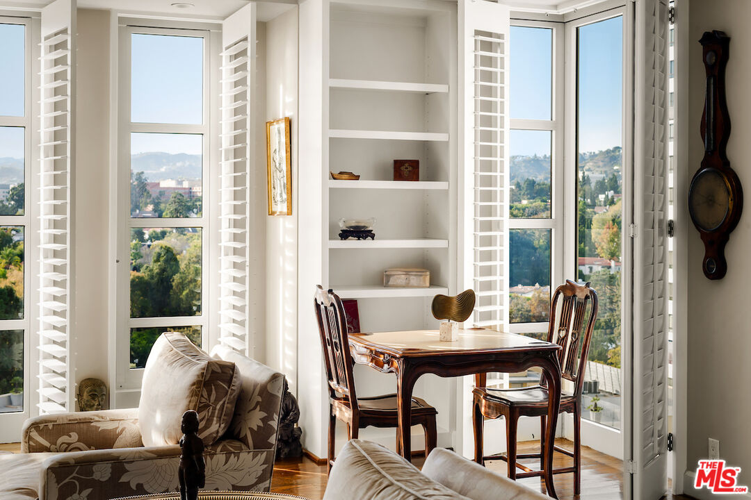 10580 Wilshire Boulevard, Unit 45 Los Angeles, CA 90024 - Photo 13 of 35 a dining room with furniture and window