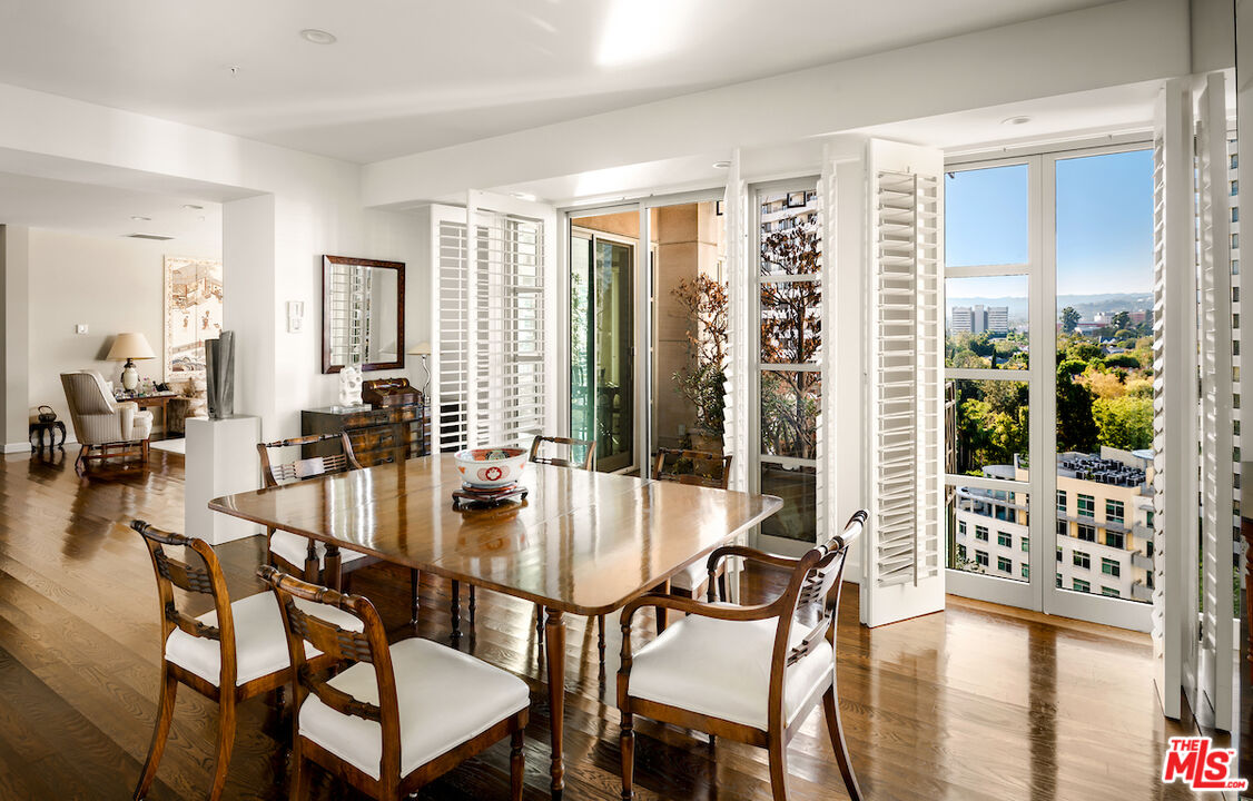 10580 Wilshire Boulevard, Unit 45 Los Angeles, CA 90024 - Photo 14 of 35 a dining room with furniture and wooden floor