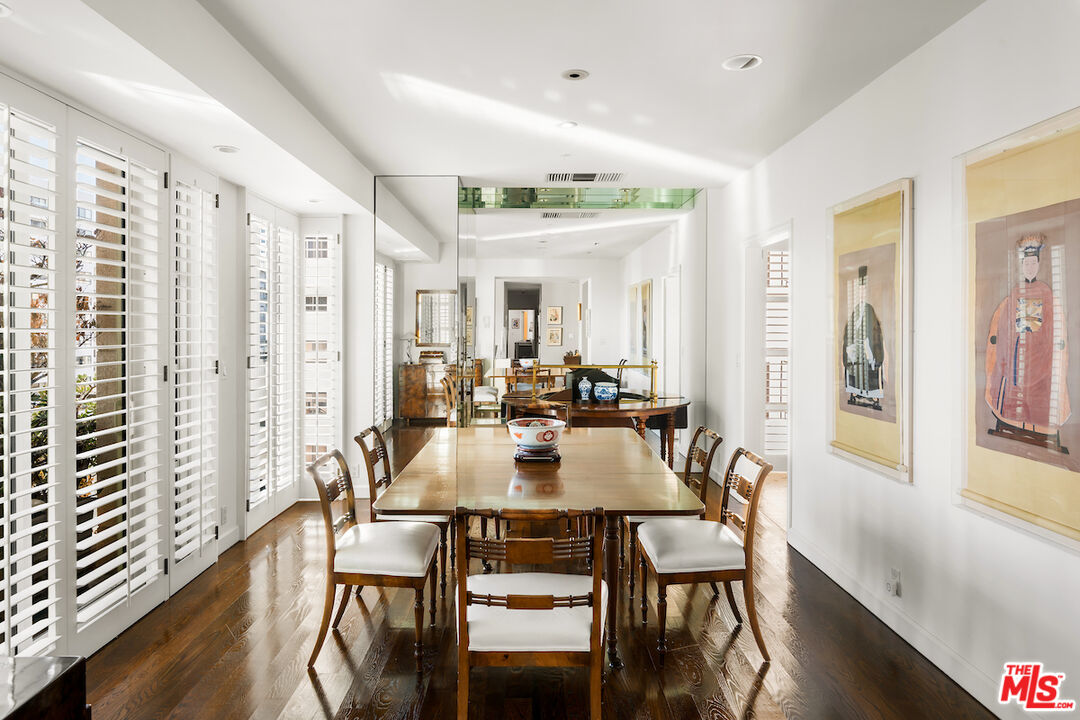 10580 Wilshire Boulevard, Unit 45 Los Angeles, CA 90024 - Photo 15 of 35 a view of a dining room with furniture window and wooden floor