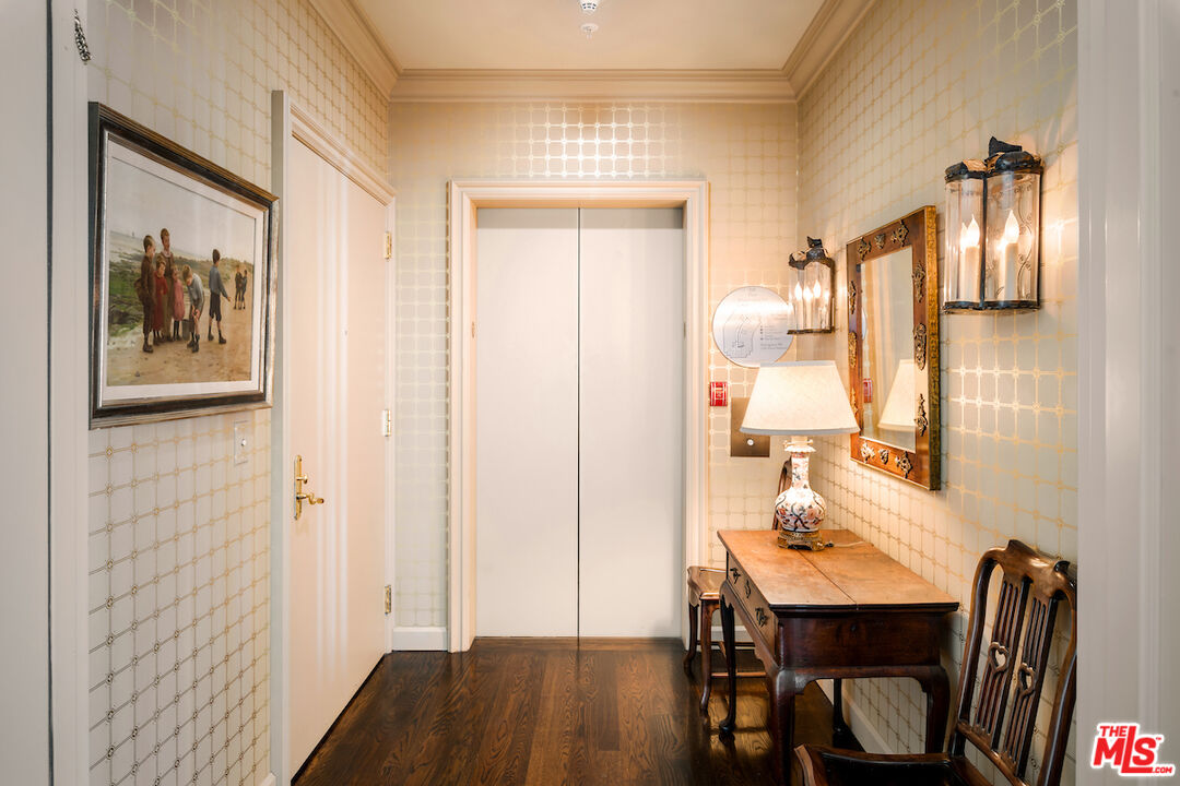 10580 Wilshire Boulevard, Unit 45 Los Angeles, CA 90024 - Photo 4 of 35 a view of a room with furniture and wooden floor